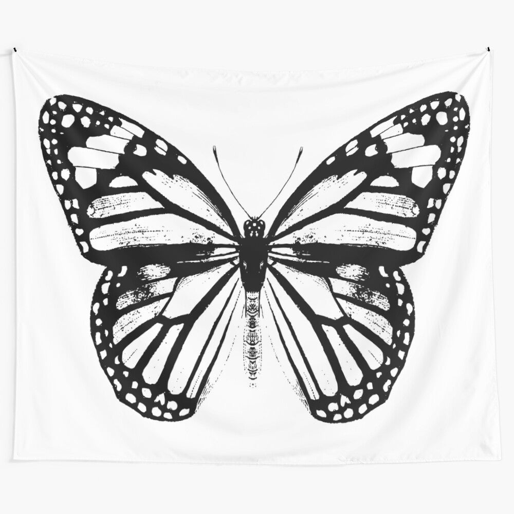 Monarch butterfly tapestry featuring a black and white design of a butterfly's wings