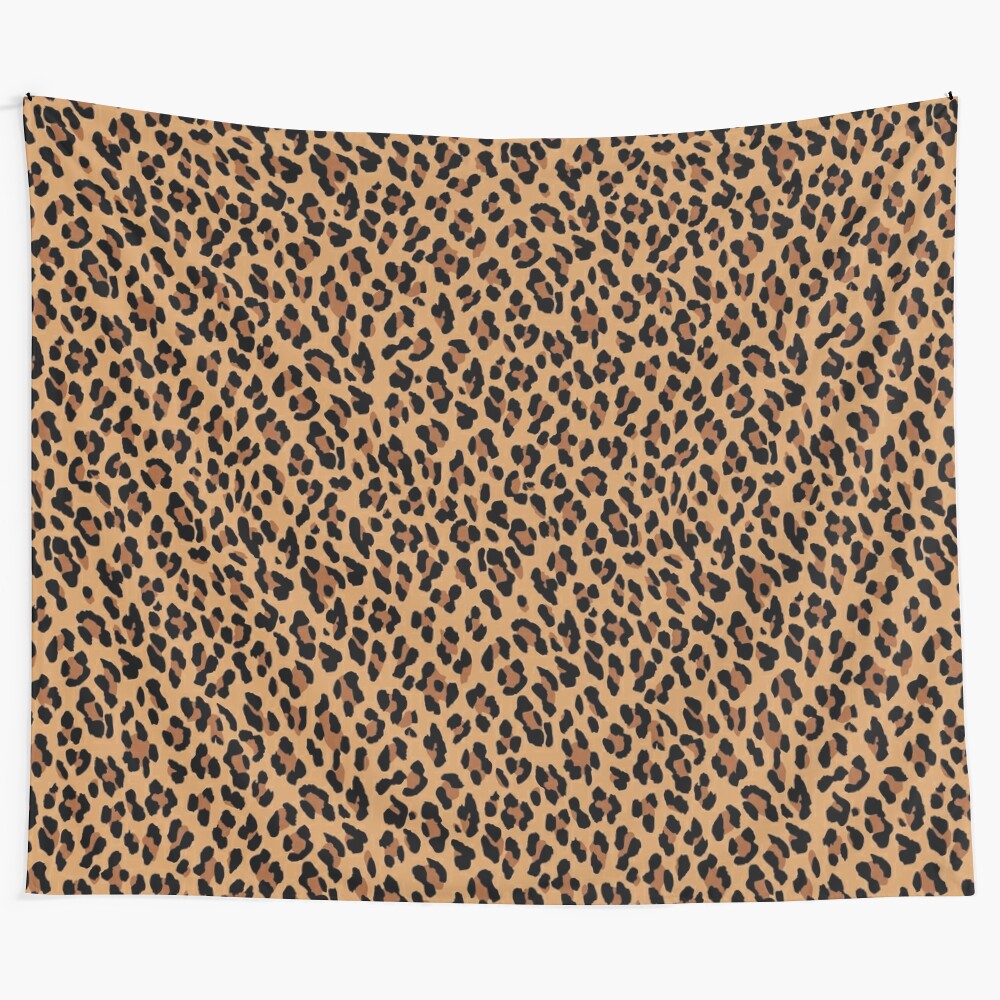 Tan leopard print tapestry with cheetah pattern and spotted design