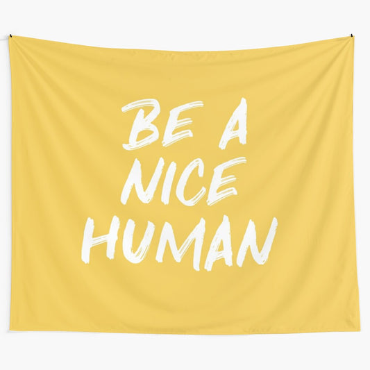 Bright yellow tapestry with kindness quote for motivational wall art