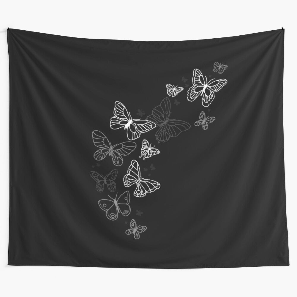 Black and white tapestry featuring beautiful butterflies in a minimalist design