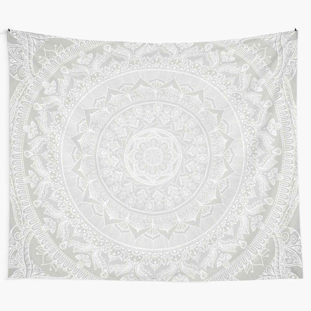 Soft gray mandala tapestry with delicate, bohemian pattern