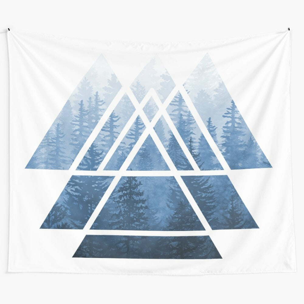 Minimalist sacred geometry triangle art tapestry featuring a misty forest landscape in shades of blue