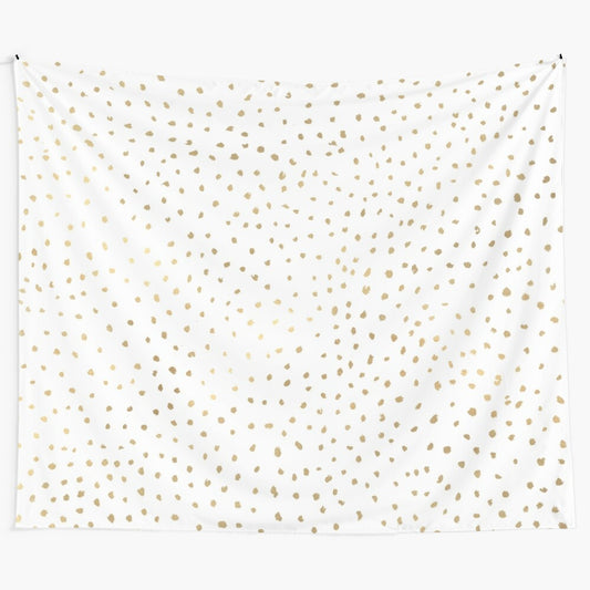 Dotted gold and white tapestry with an abstract, modern pattern