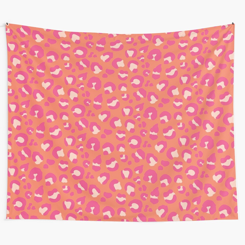 Leopard print tapestry in coral, pink, and nude colors