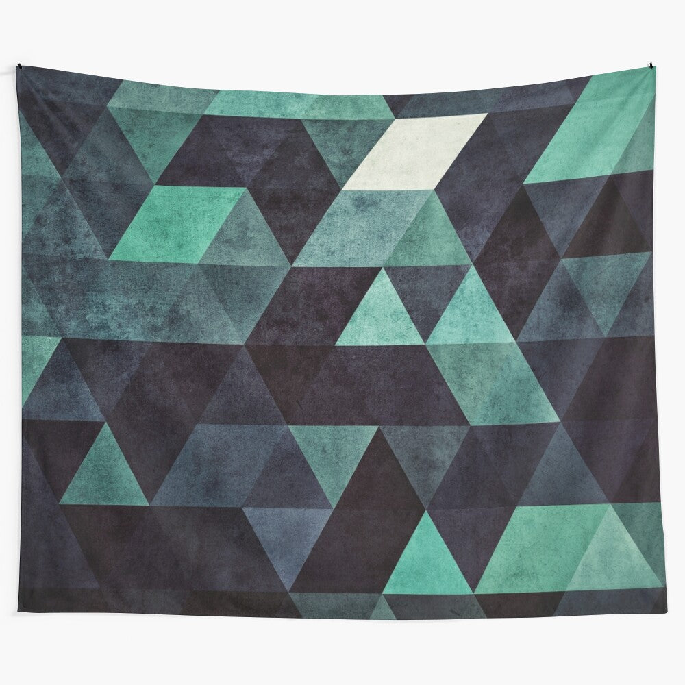 Abstract geometric ddrypp tapestry with teal, green, and blue triangles and parallelograms