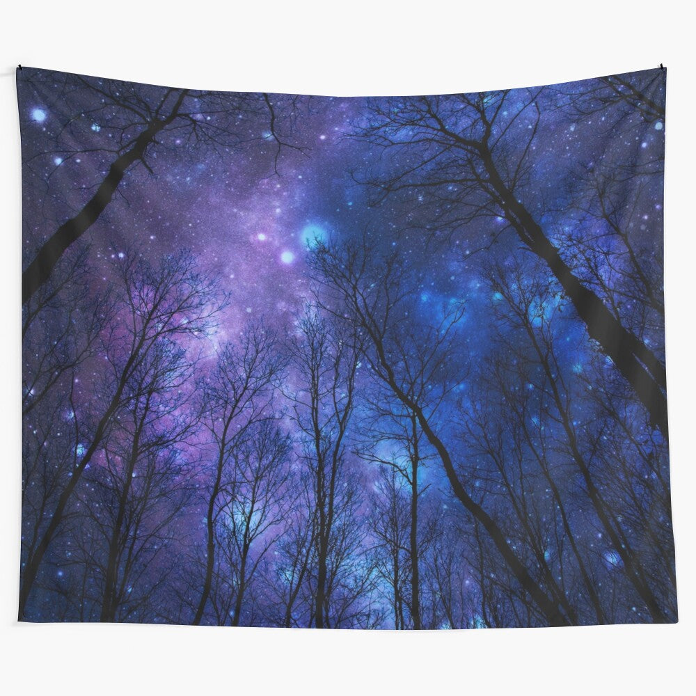 Cosmic galaxy space tapestry featuring a vibrant purple and blue nebula with stars and planets