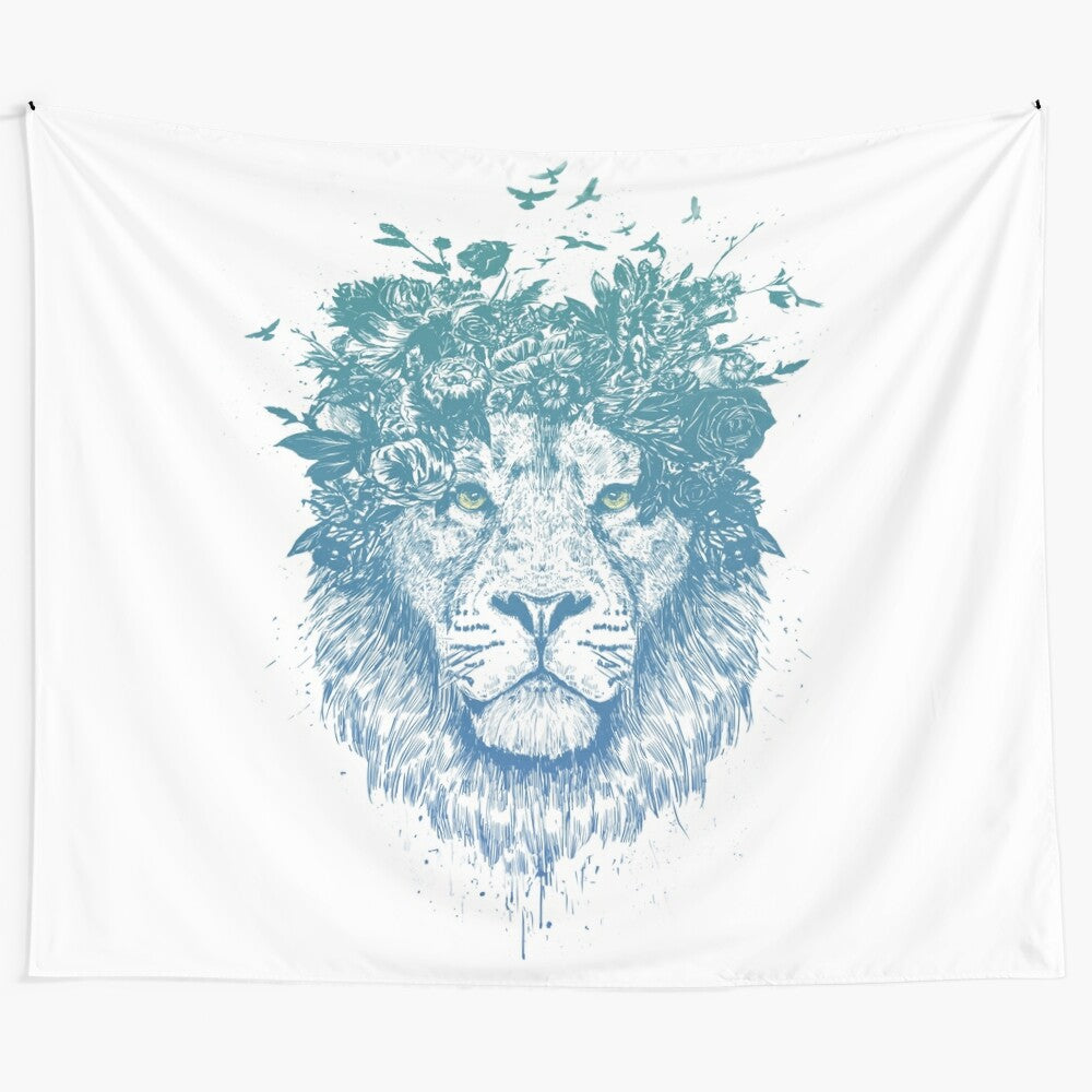 Floral lion tapestry featuring a surreal, dreamy illustration of a lion with flowers, butterflies, and birds