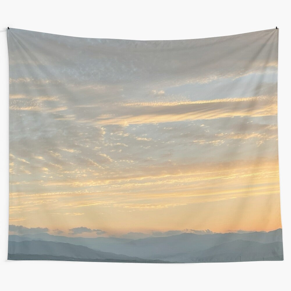 Vibrant orange sunset tapestry showcasing a peaceful natural landscape