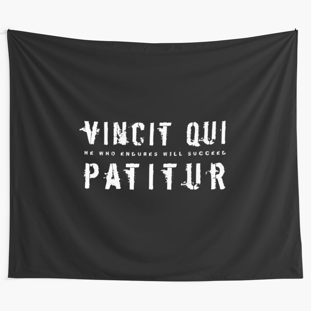 Latin inspirational quote tapestry featuring the phrase "Vincit Qui Patitur"