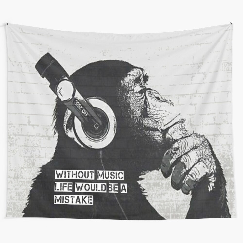 Banksy-inspired tapestry with a quote about the importance of music in life