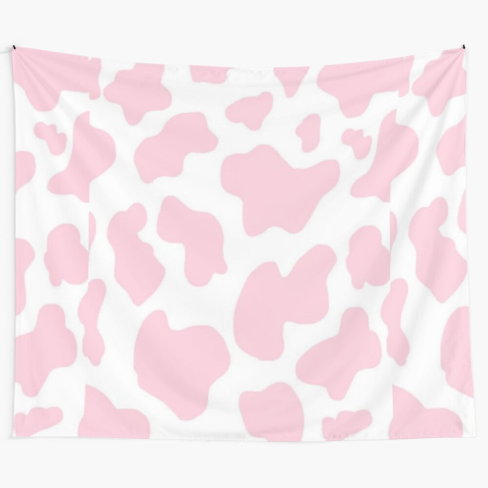 Pink and white cow print tapestry with aesthetic design