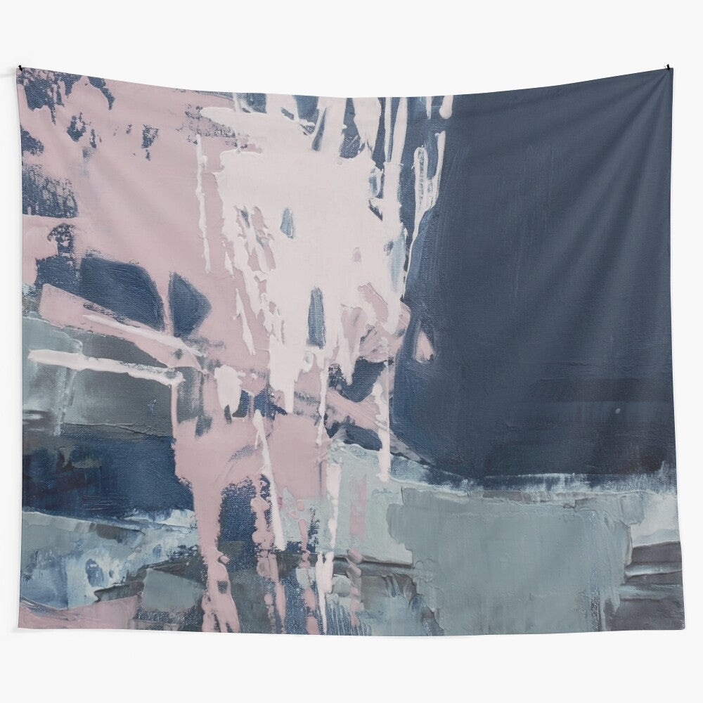 A modern abstract tapestry featuring a square design in a blend of pink, navy, and mint colors for a Scandinavian-inspired look.