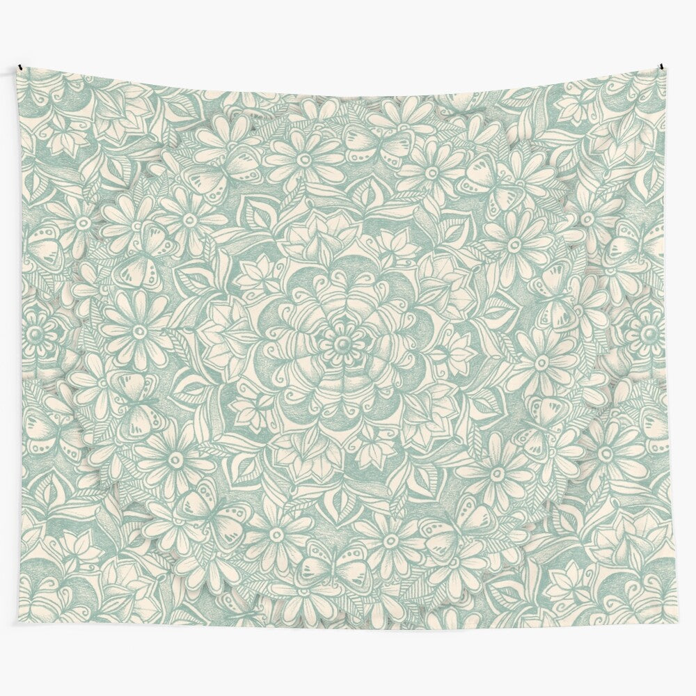 Vintage-inspired sage green tapestry with a medallion design, butterflies, and daisy flowers