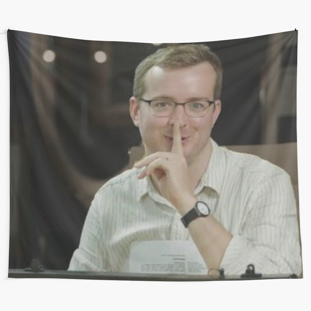 Griffin McElroy, one of the popular podcast hosts from The McElroy Brothers, featured on a vibrant tapestry design