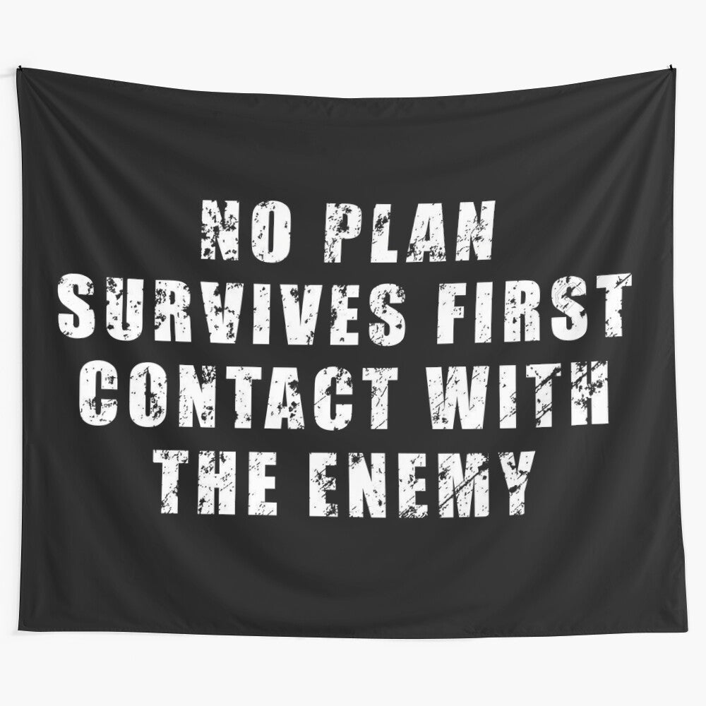 Motivational tapestry with the quote "No plan survives first contact with the enemy"