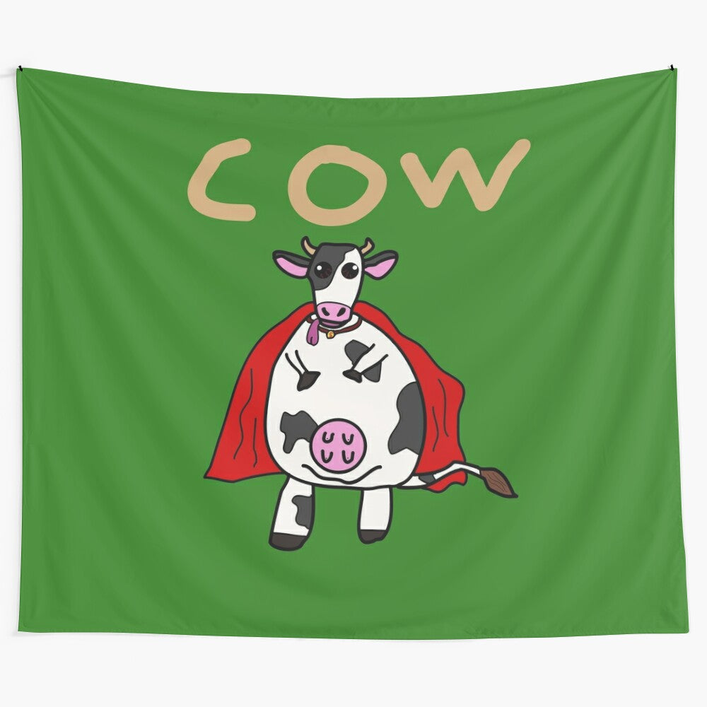 Whimsical cartoon-style tapestry featuring a cow wearing a red cape