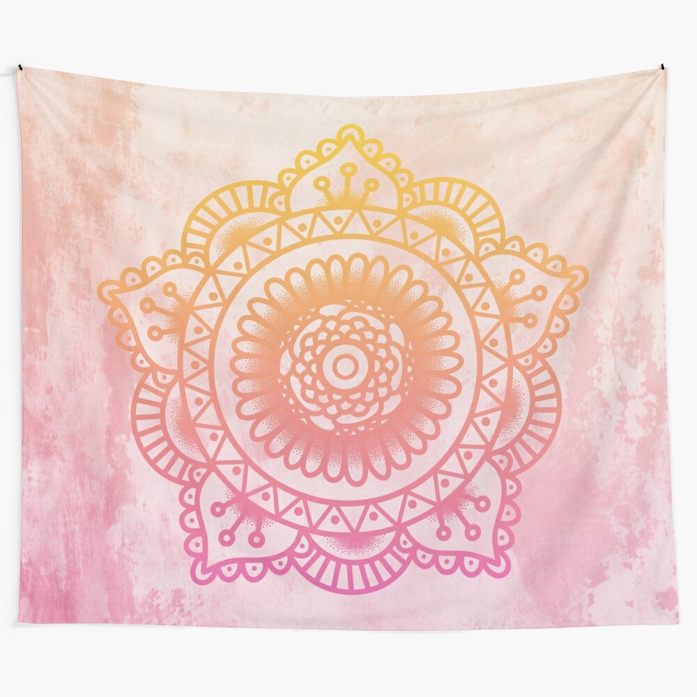 Colorful boho mandala tapestry with pink, yellow, and purple accents