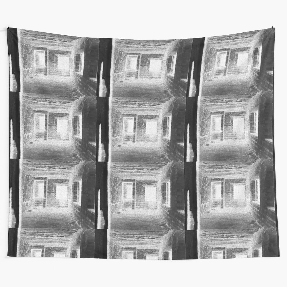 Monochrome tapestry depicting abandoned and haunted places