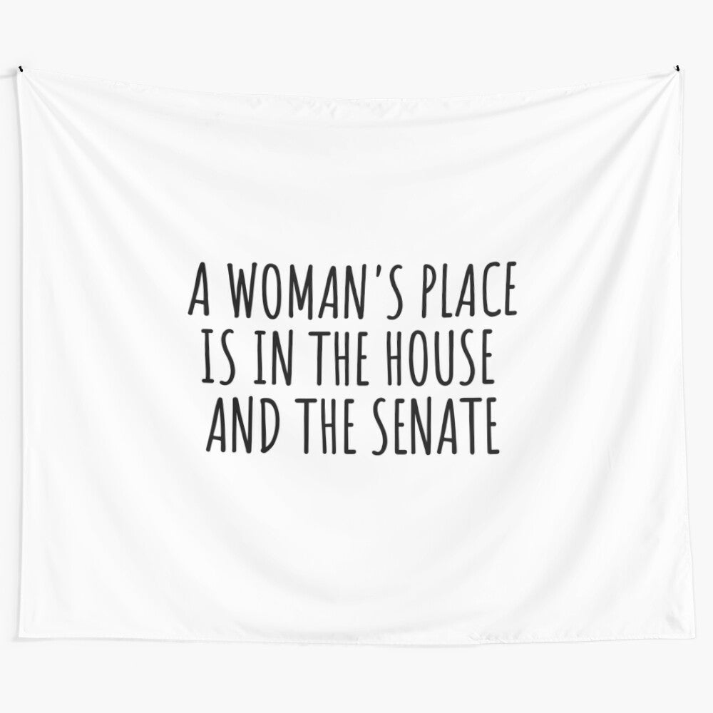 Tapestry featuring the slogan "A Woman's Place is in the House and Senate" with feminist and political elements