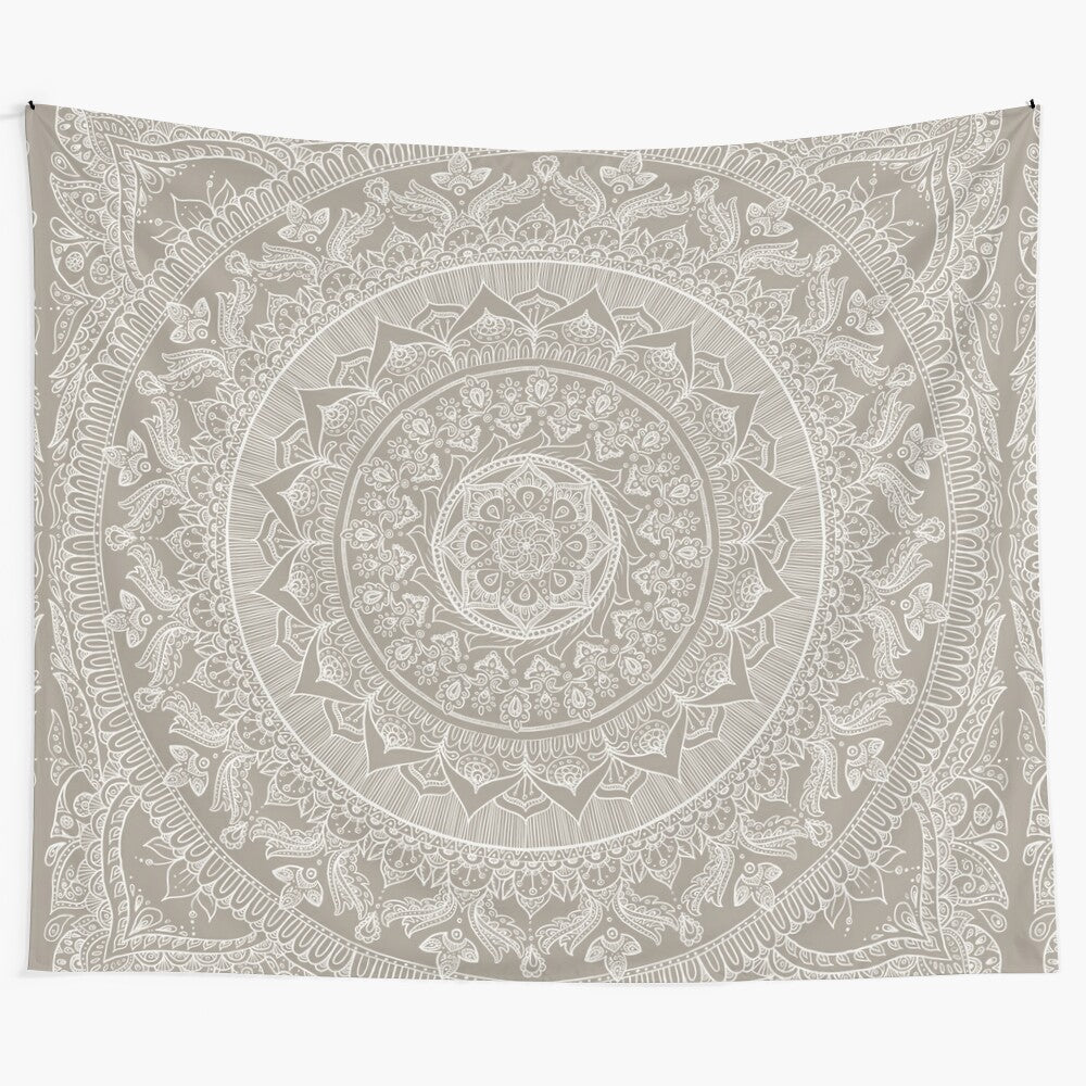 Taupe-colored mandala-patterned tapestry with delicate lace-like design