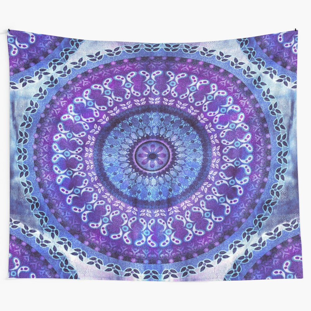 Vibrant and intricate mandala design tapestry in various shades of purple, blue, and white