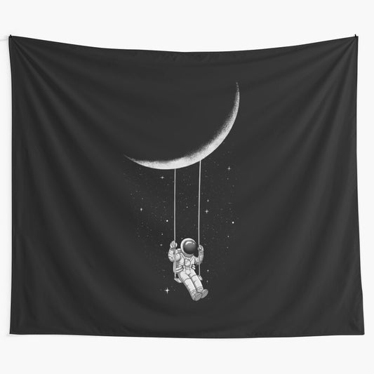 Surreal black and white tapestry depicting a moon-shaped swing in a cosmic, abstract landscape