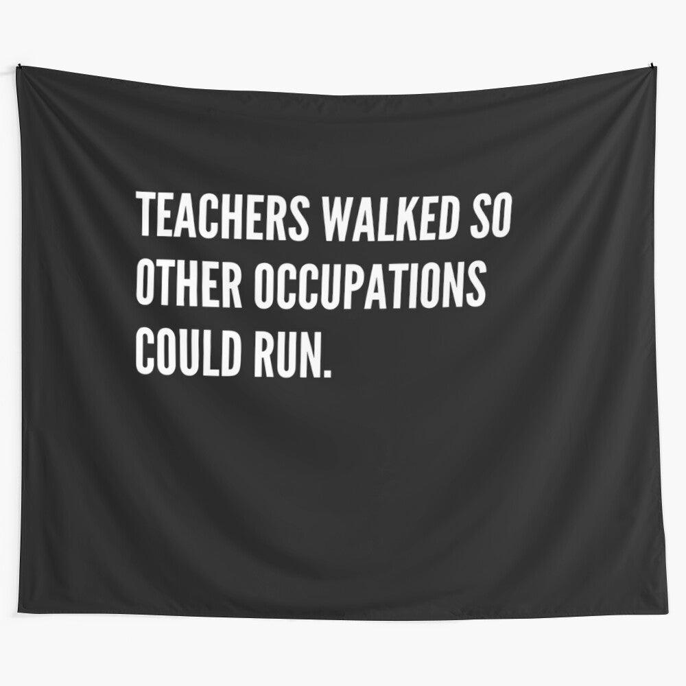 A tapestry design with the text "Teachers Walked So Other Occupations Could Run"