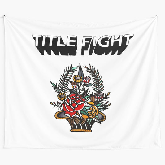 Colorful tapestry featuring the name 'Title Fight' and floral patterns