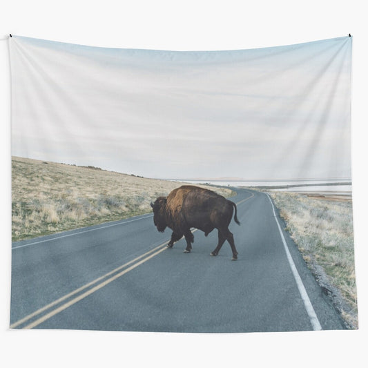 Bison herd crossing a desert landscape in the American Southwest