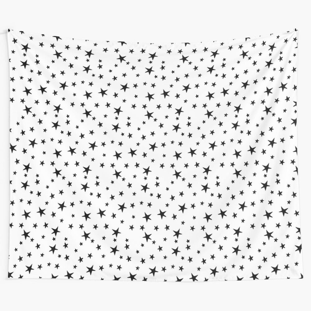 Black and white tapestry featuring a starry night sky pattern