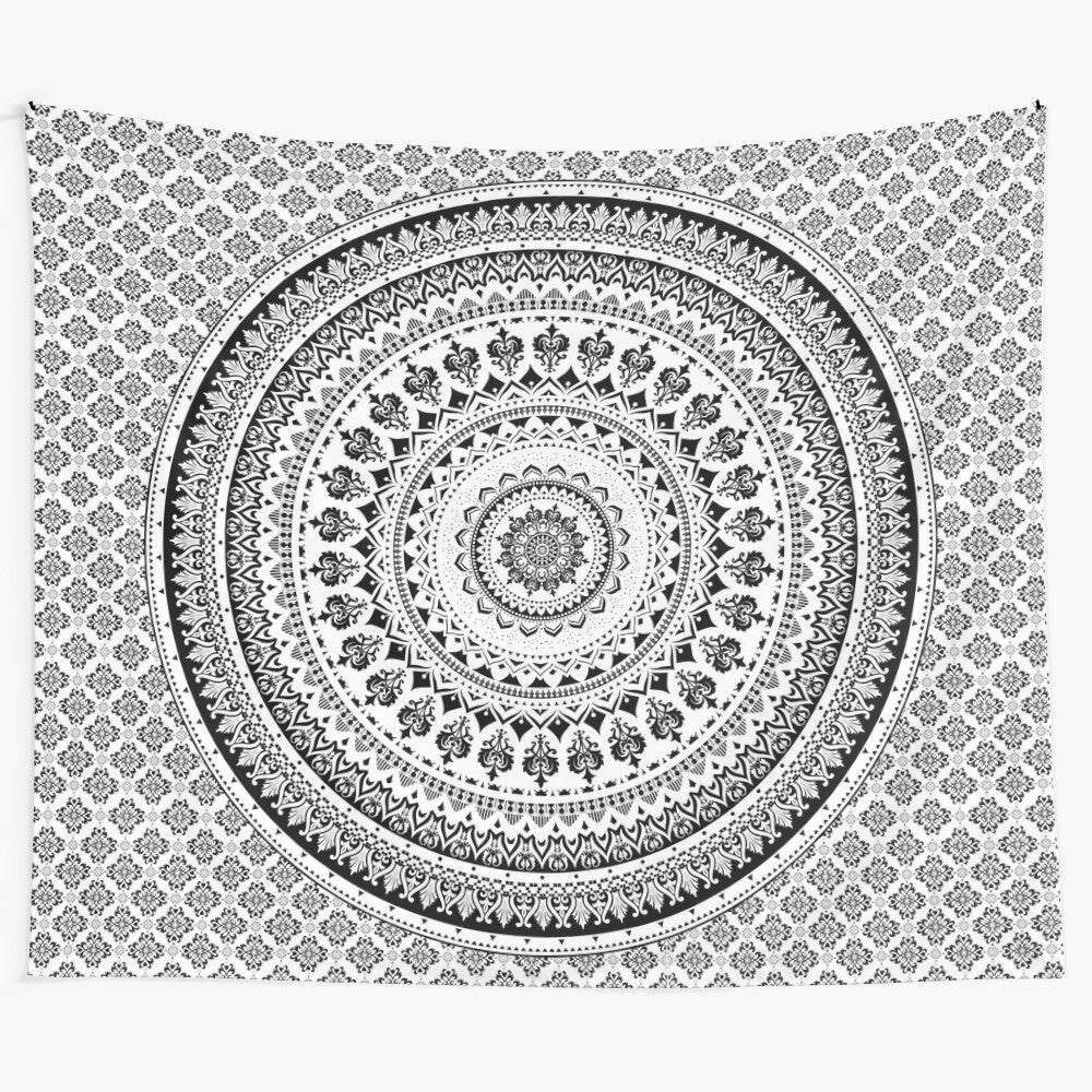 Monochrome mandala tapestry with intricate tribal and cosmic patterns