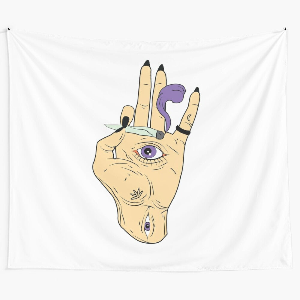 Trippy psychedelic eye tapestry wall art featuring a hand and cannabis leaf