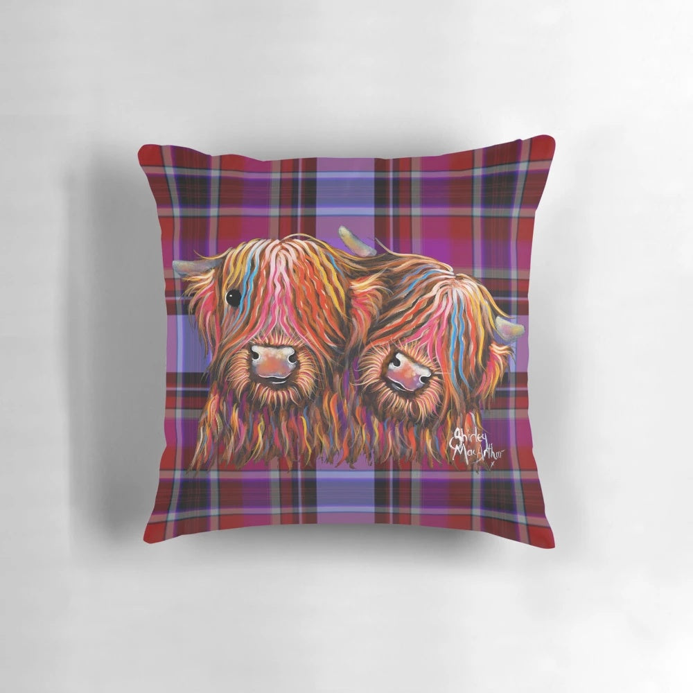 Cozy tartan print pillow featuring a charming highland cow illustration