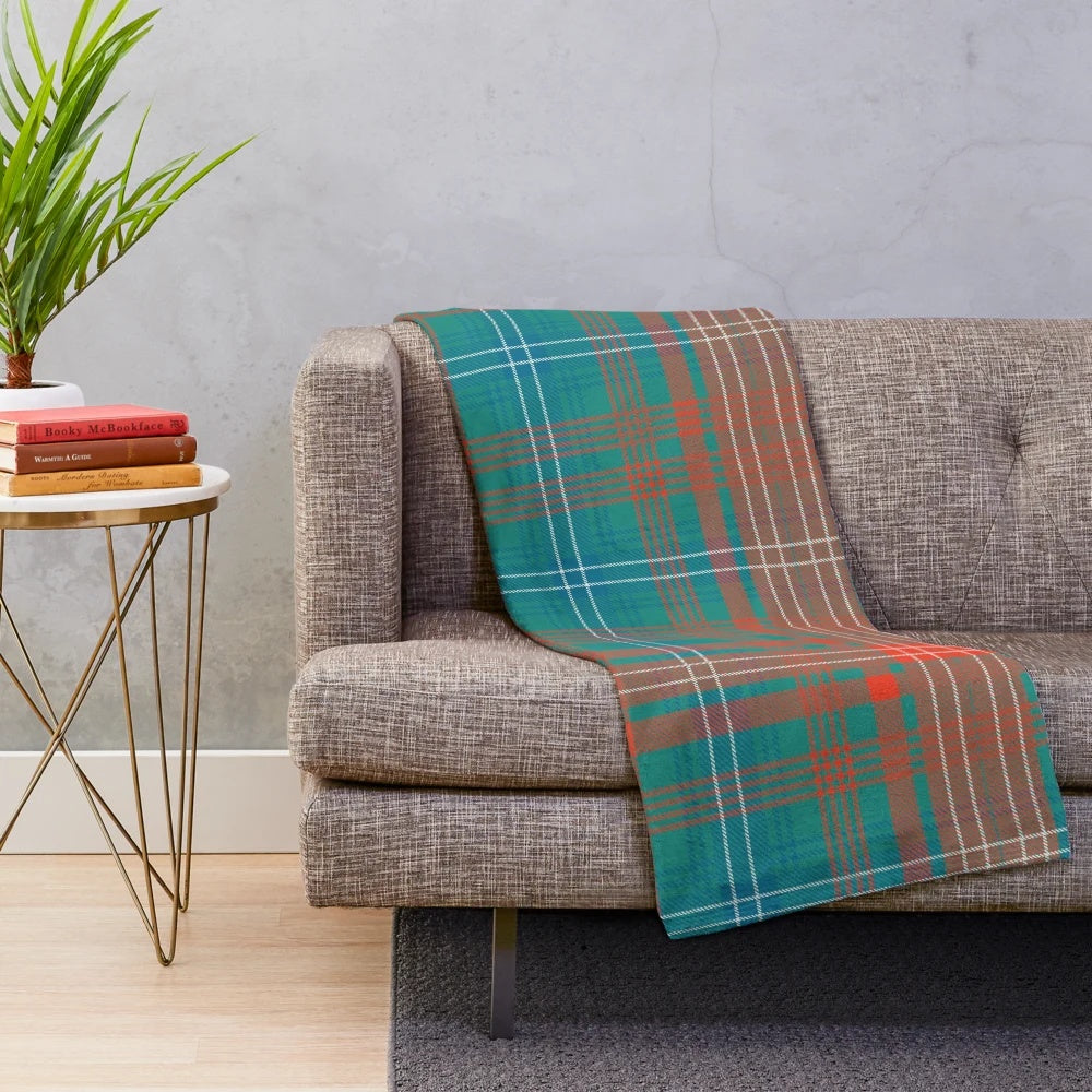 Tartan-style plaid plush blanket in green and blue colors