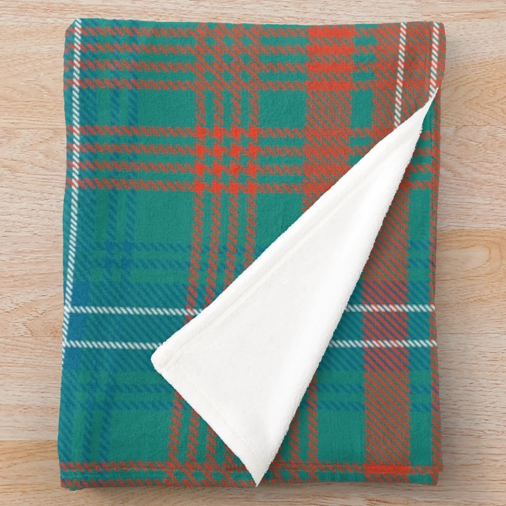 Tartan-style plaid plush blanket in green and blue colors