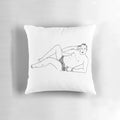 A colorful and whimsical pillow featuring a poorly drawn illustration of Taskmaster host Greg Davies.