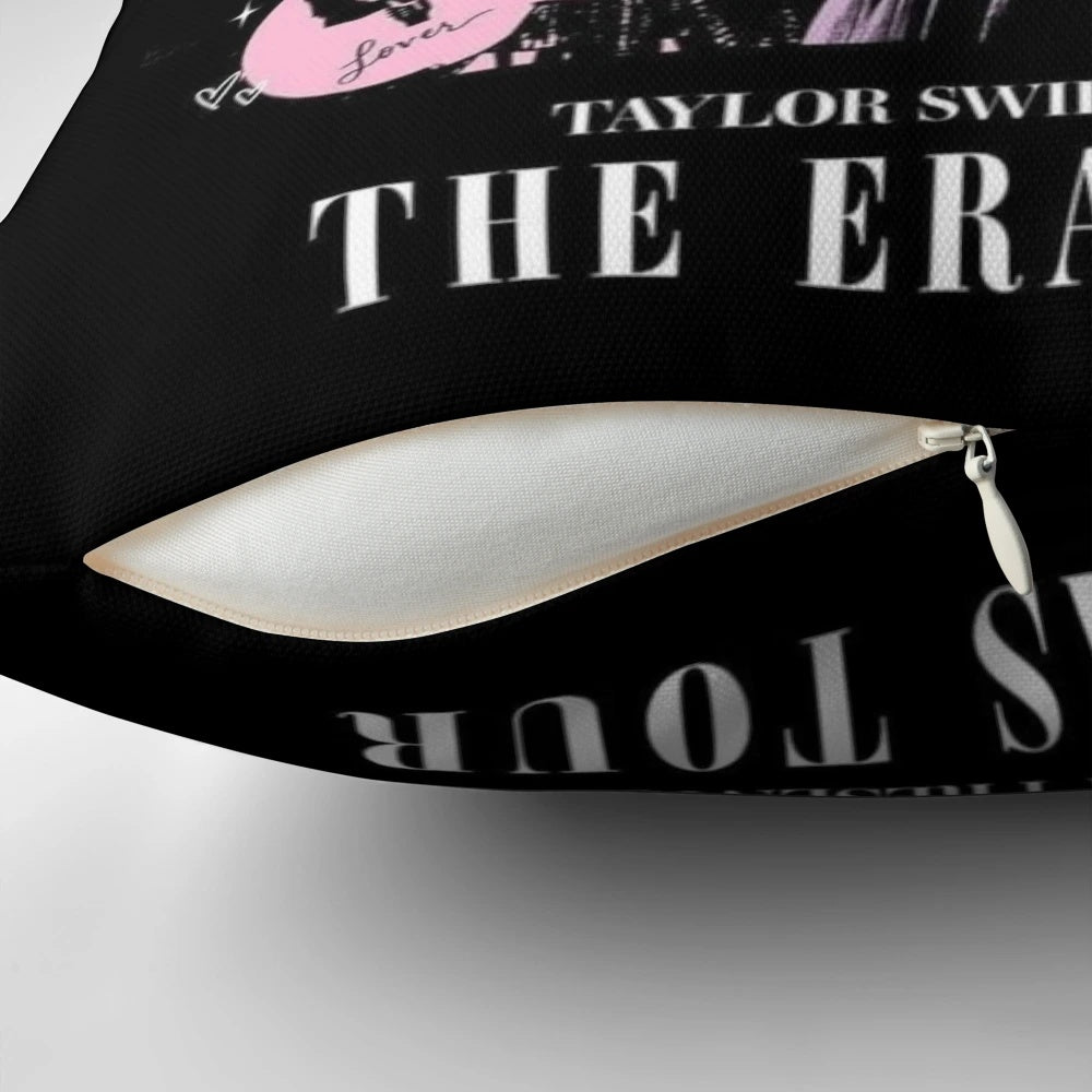 A soft, cozy pillow featuring Taylor Swift's 'The Eras Tour' logo and imagery.
