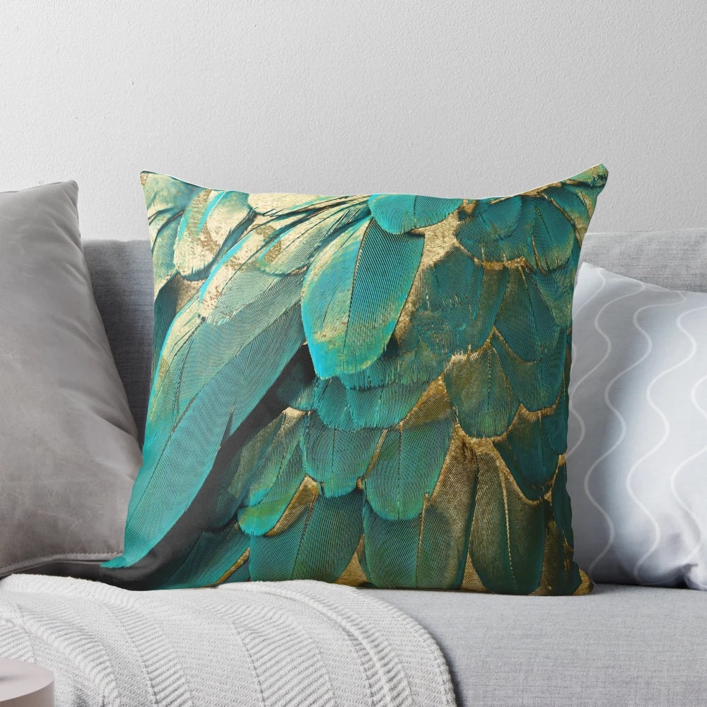 Teal and gold feather-adorned accent pillow for home decor