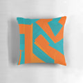 Teal and orange abstract art throw pillow with geometric patterns