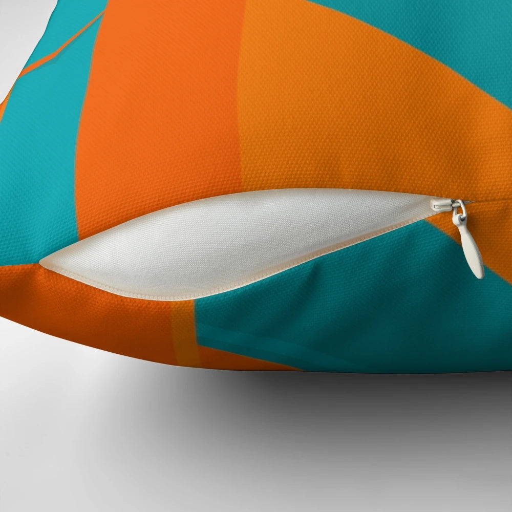 Teal and orange abstract art throw pillow with geometric patterns