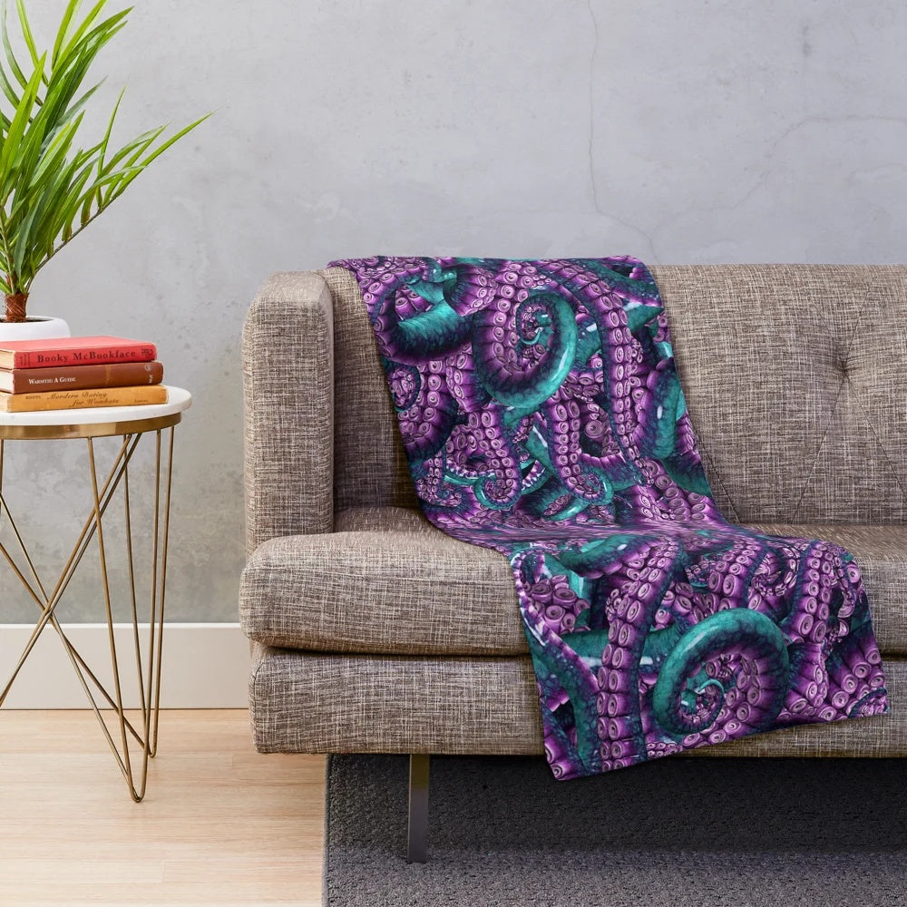 Teal and violet plush blanket featuring an octopus design inspired by horror themes