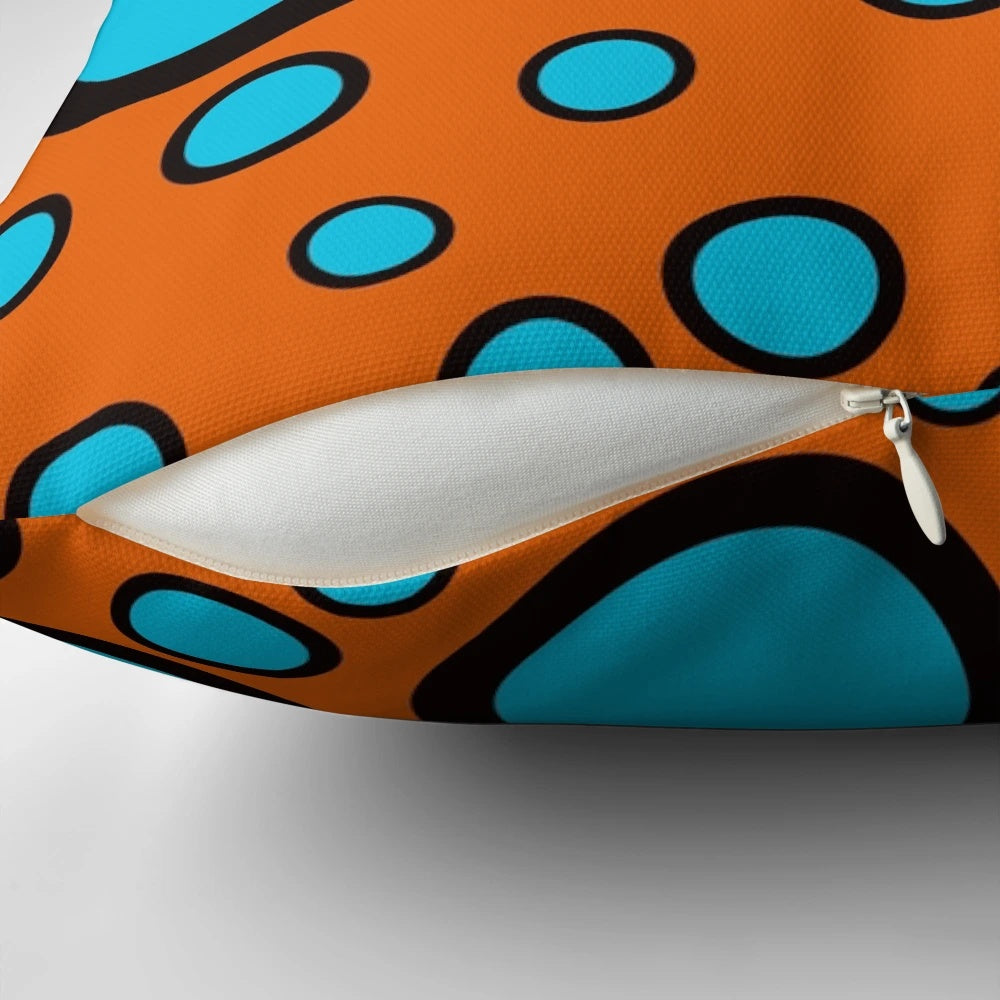 Teal, black and orange polka dot patterned throw pillow for home decor