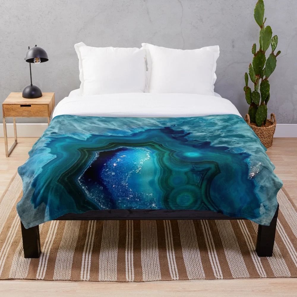 Teal blue agate plush blanket with a beautiful shimmering, sparkling, and glittering texture