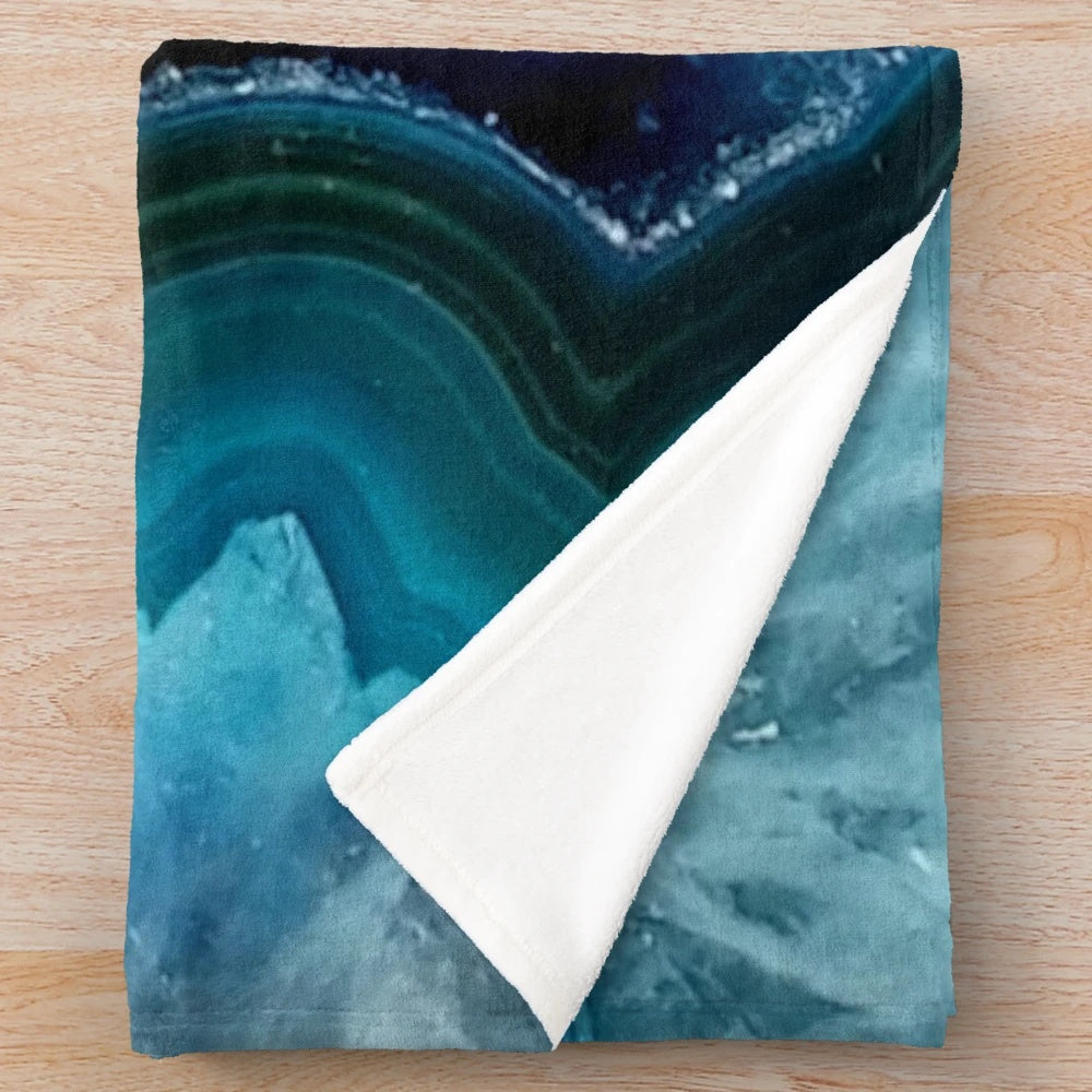 Teal blue agate plush blanket with a beautiful shimmering, sparkling, and glittering texture