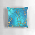 Teal blue faux marble and gold glitter veins decorative pillow with a stylish, marbled texture.