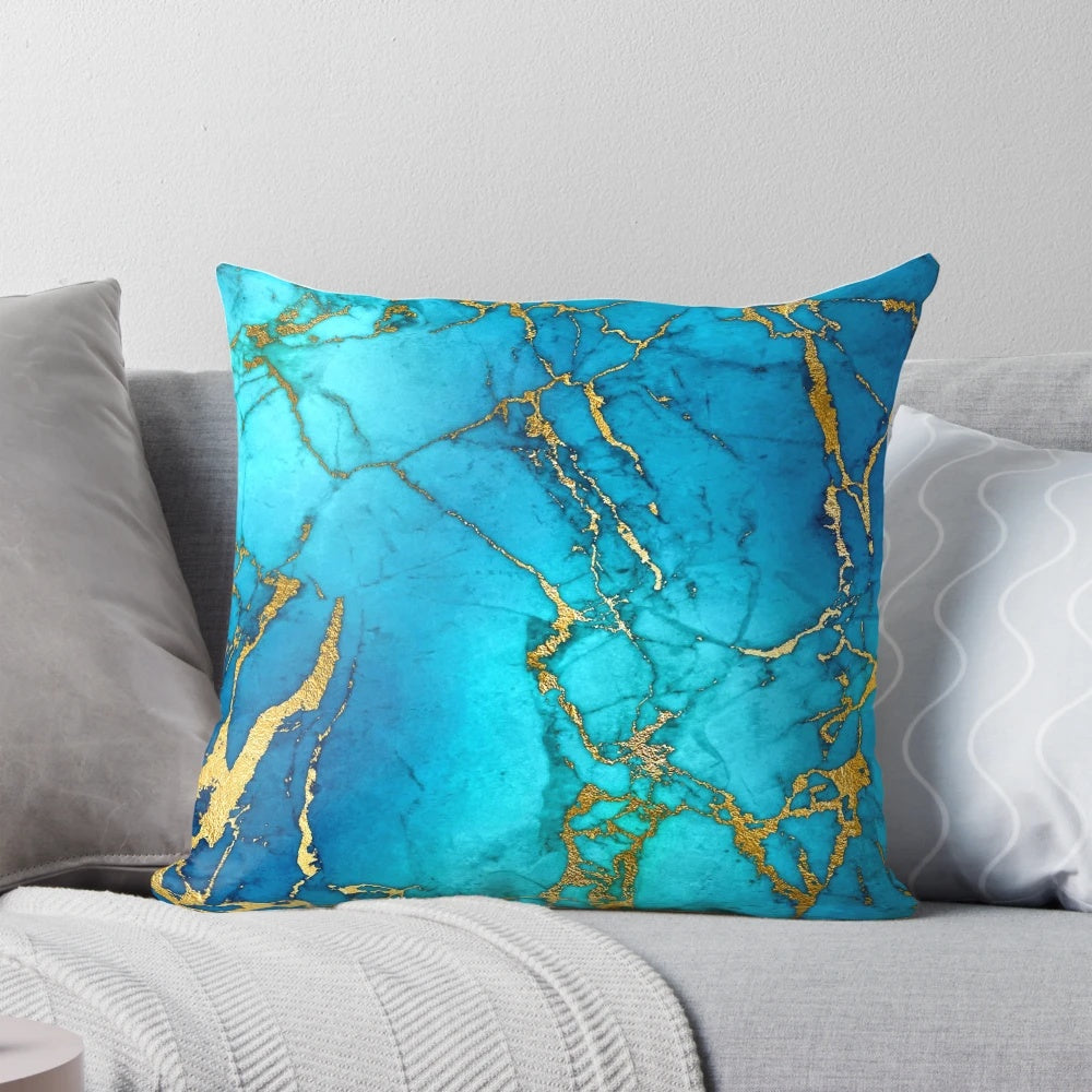 Teal blue faux marble and gold glitter veins decorative pillow with a stylish, marbled texture.
