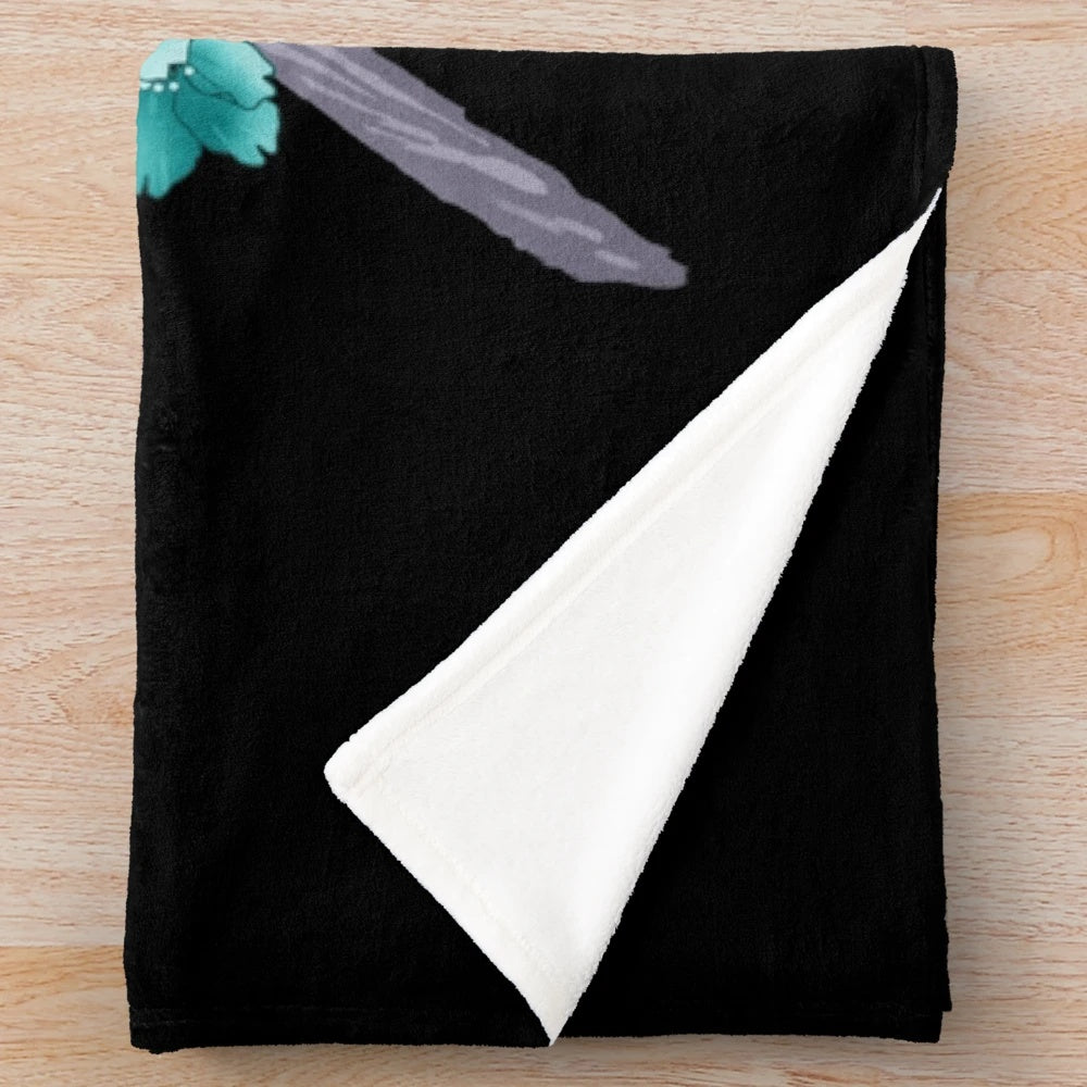 Teal blue sakura cherry blossom petals falling on a plush blanket