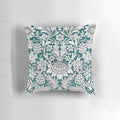 Teal blue and white floral leaves pattern pillow featuring a William Morris design