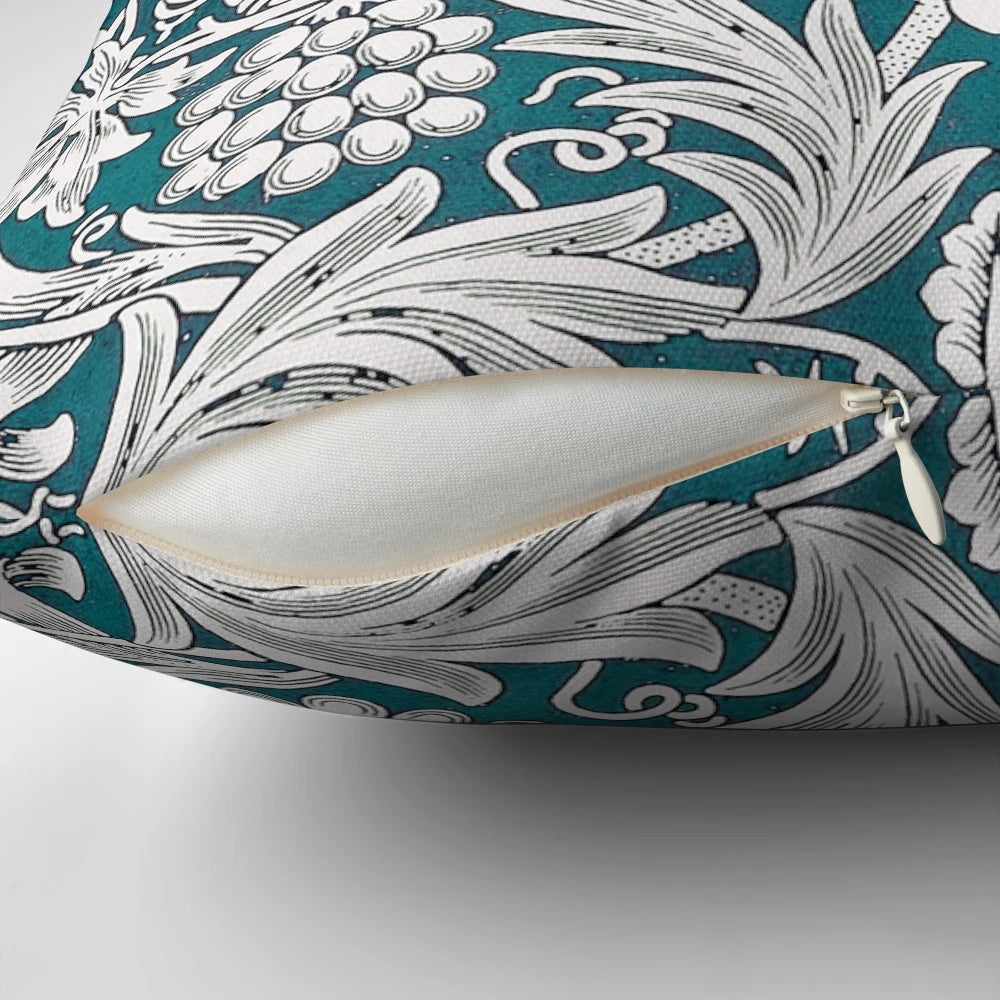 Teal blue and white floral leaves pattern pillow featuring a William Morris design
