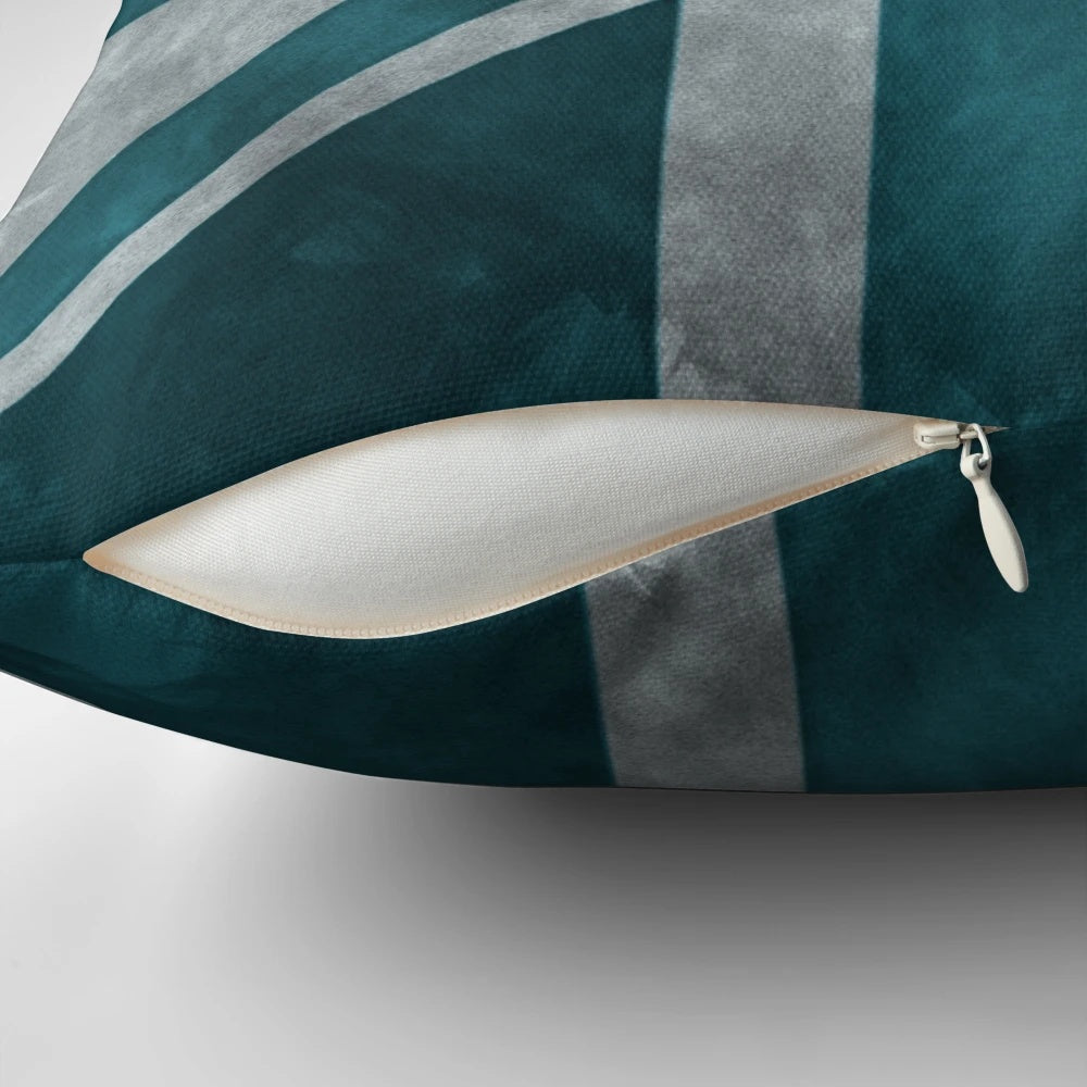 Teal distressed vintage union jack pillow with a worn, grunge design